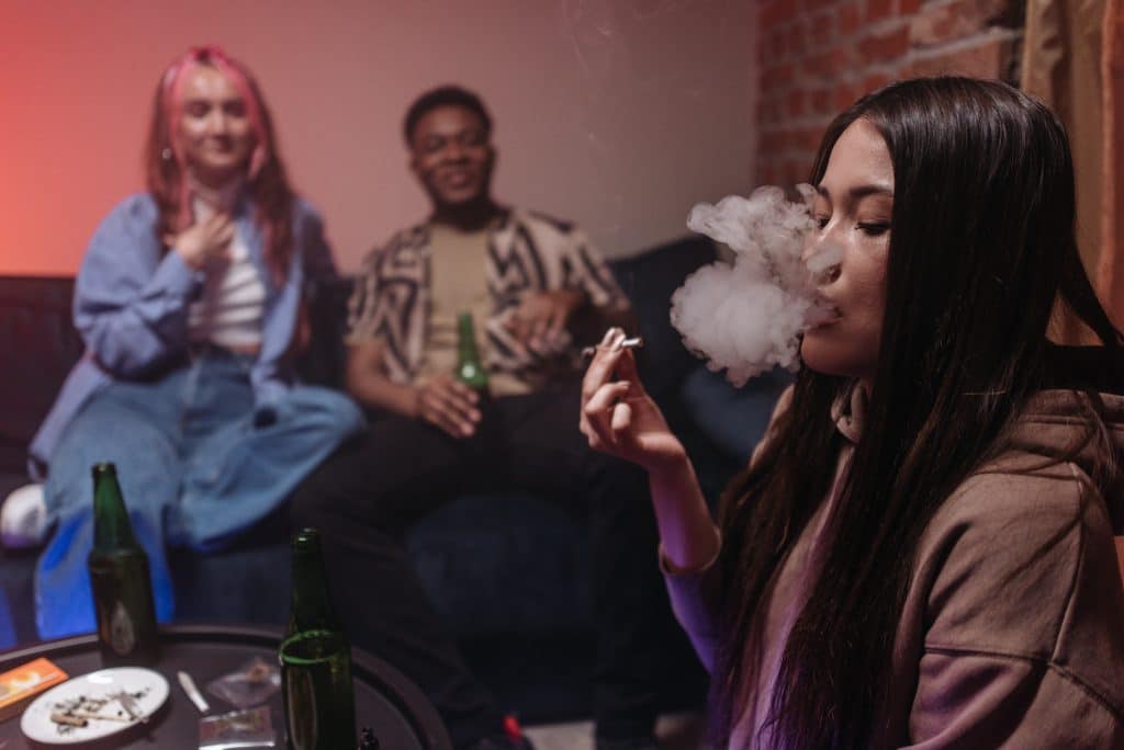 Avoid smoking cannabis alone but with friends is better